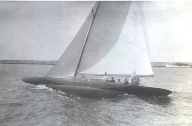Five people in sailing vessel