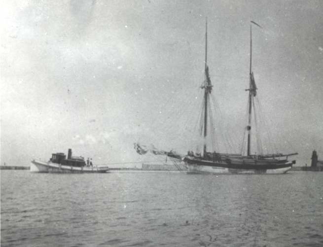Tug Navagh towing schooner