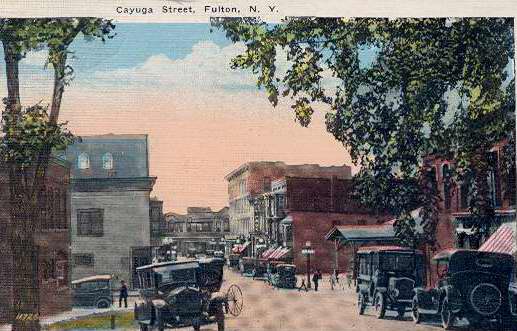 Color postcard showing a view of Cayuga Street, Fulton, N. Y. Number 11726 stamped on front. - Page 1