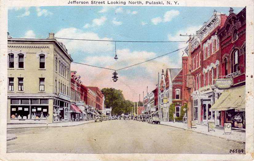 Color postcard with caption, "Jefferson Street Looking North, Pulaski, N.Y."  Handwritten message on back.  Pulaski postmark. - Page 1