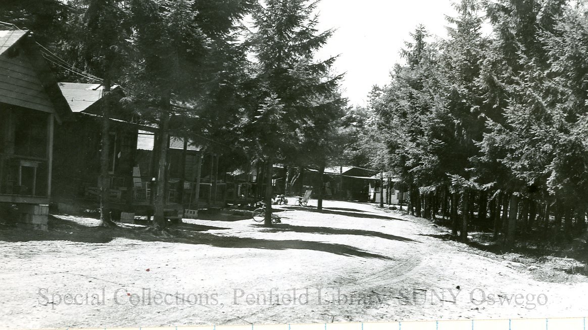 Winter scene - Camp Shady Shore with 4 unidentified people - Winter scene - Camp Shady Shore with 4 unidentified people