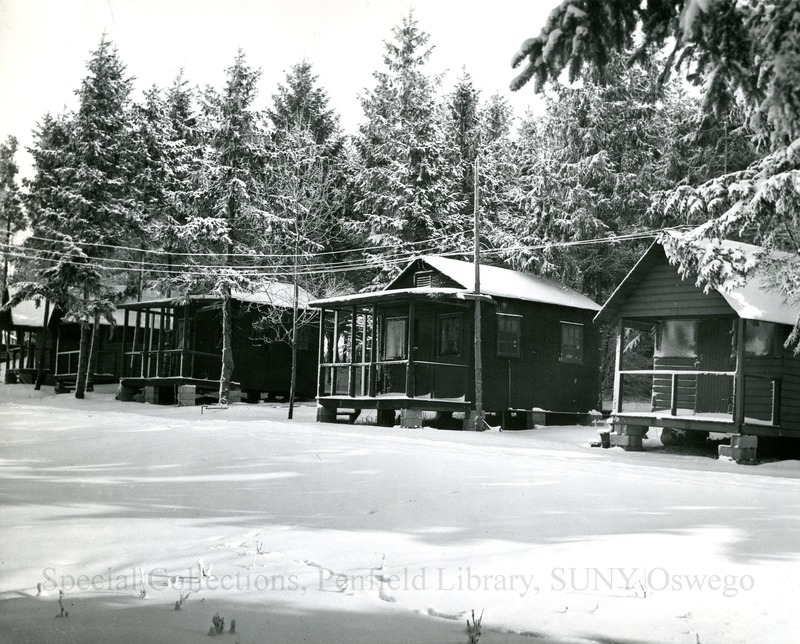 Winter scene - Camp Shady Shore with 4 unidentified people - Winter scene - Camp Shady Shore with 4 unidentified people