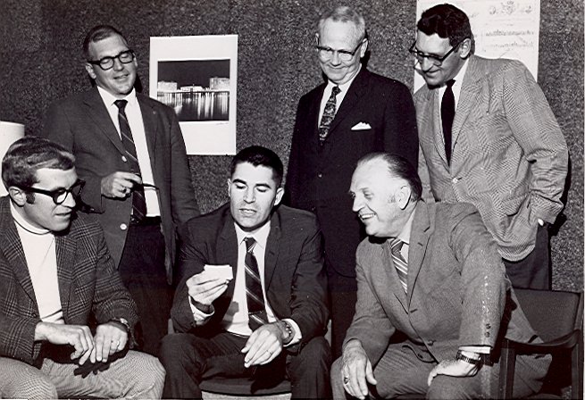 Dr. James E. Perdue - a.  Dr. James Perdue, seated, 2nd from left / unidentified students