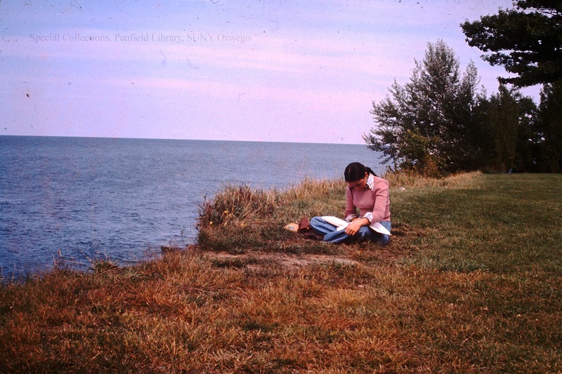 Student on lakeshore