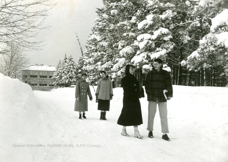 Winter - 07-08  Clearing car of snow.  January 1956