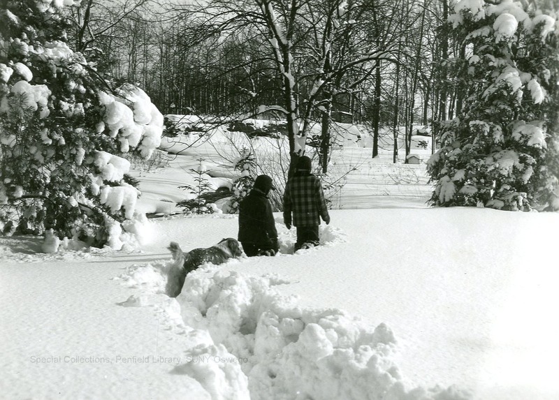 Winter - 07-08  Clearing car of snow.  January 1956