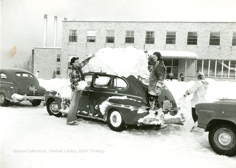 Winter - 07-08  Clearing car of snow.  January 1956